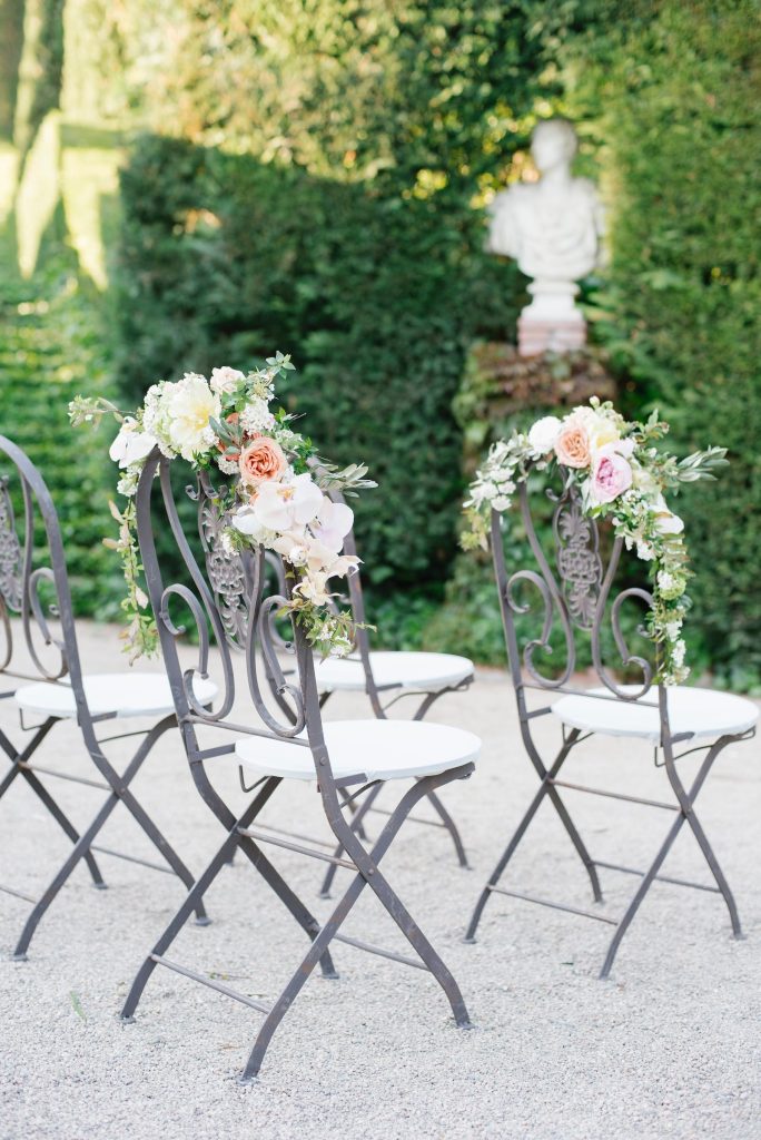 decorated chairs with flowers